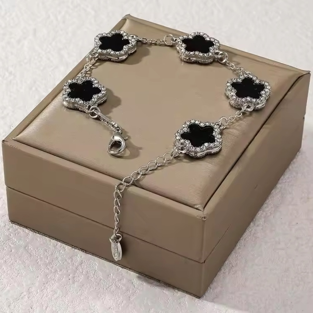 Sophisticated Silver and Black Clover Bracelet